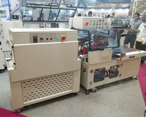 Shrink film packaging machine